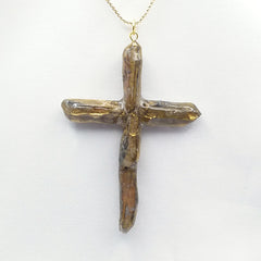 Gold Titanium Quartz Cross necklace apx. 3" long with Goldtone chain