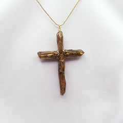 Gold Titanium Quartz Cross necklace apx. 3" long with Goldtone chain